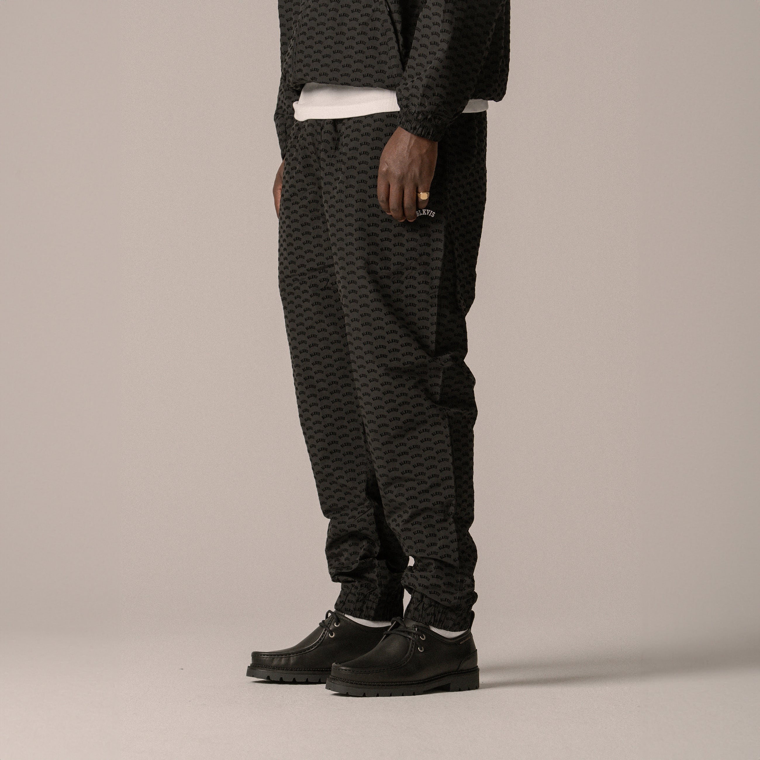 BLKVIS ALLOVER TRACK PANTS - BLACK