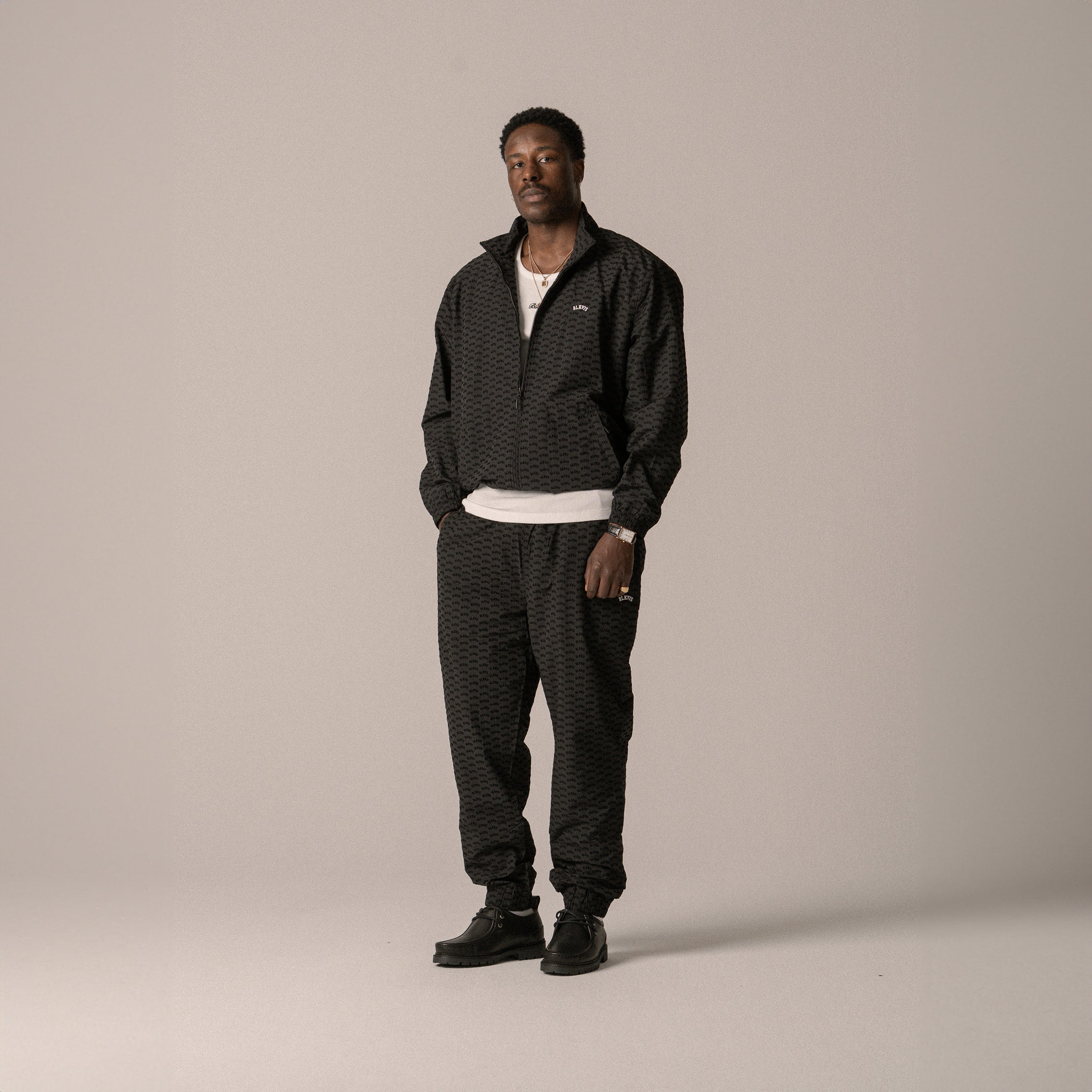 BLKVIS ALLOVER TRACK PANTS - BLACK